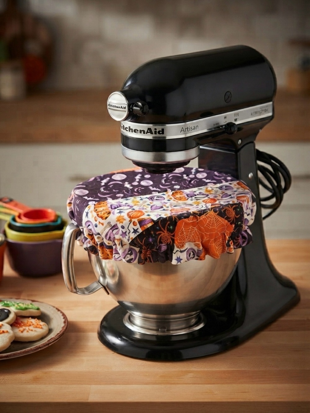 KitchenAid Black Stand Mixer with Purple and Orange Decorative Bowl Cover